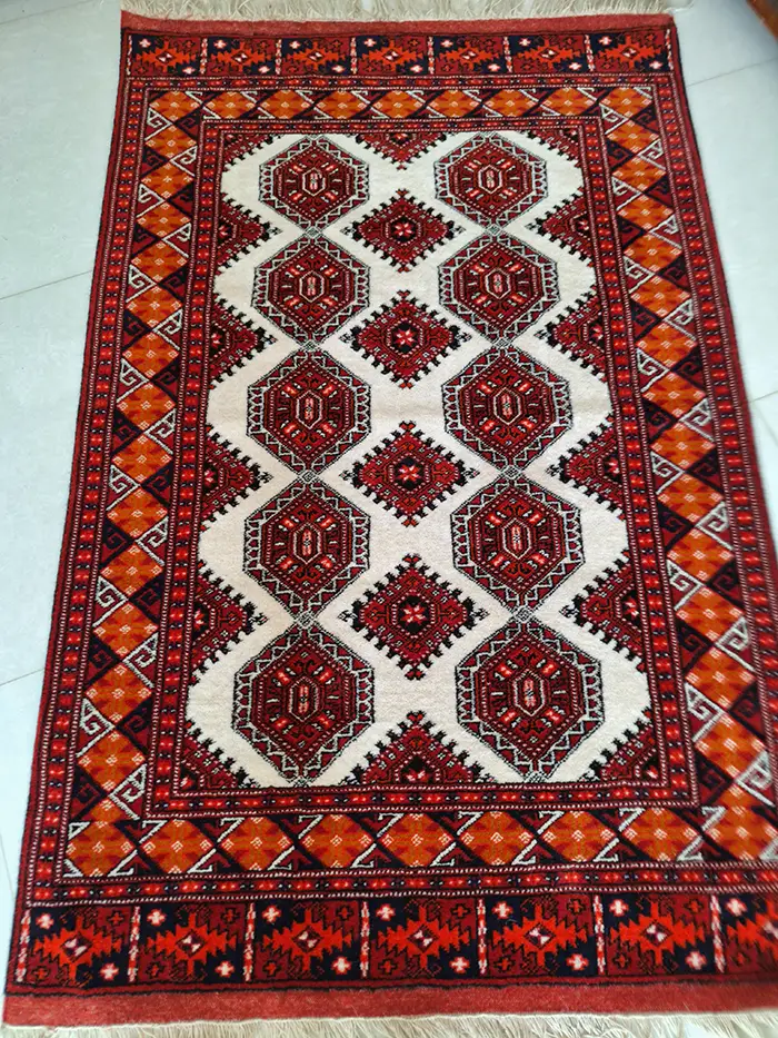 قیمت فرش ترکمن دستباف طرح کجاوه گل حاشیه