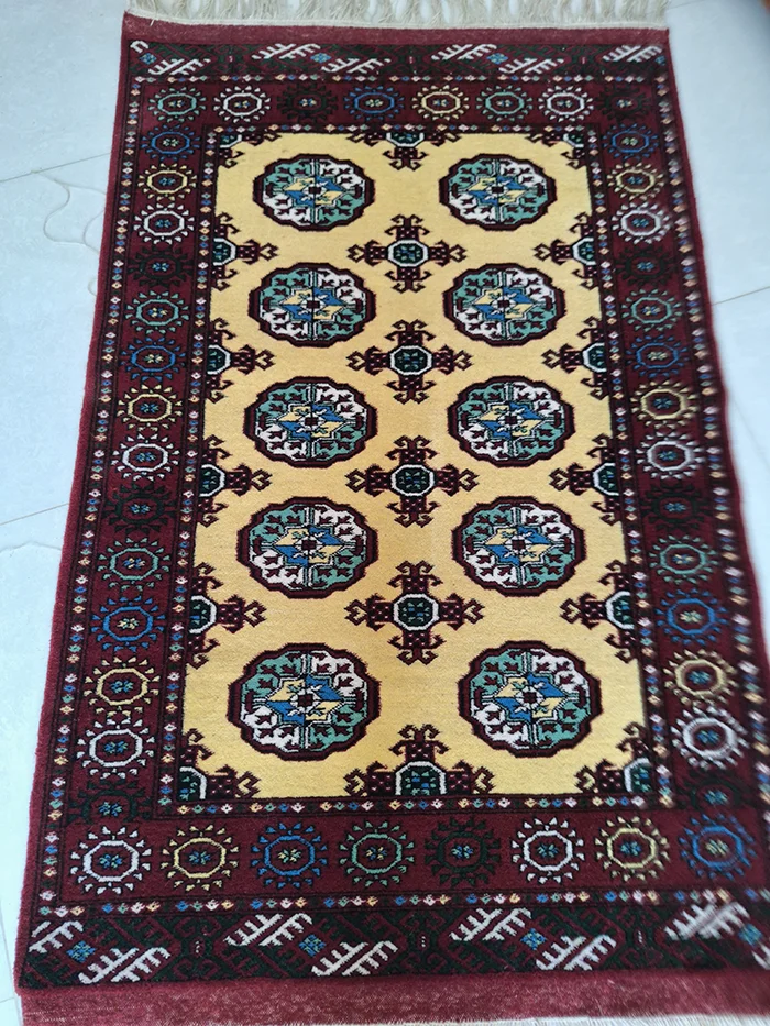 قیمت فرش ترکمن دستباف طرح ماری گل زرد